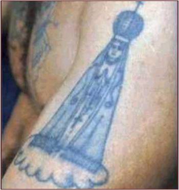 Tatuagens de Bandidos, saiba o significado delas 10 Tatuagem de Nossa Senhora Aparecida